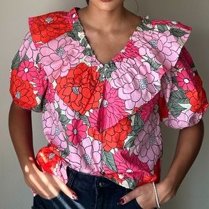 Women’s boutique flower cotton-gauze v-neck ruffle top.